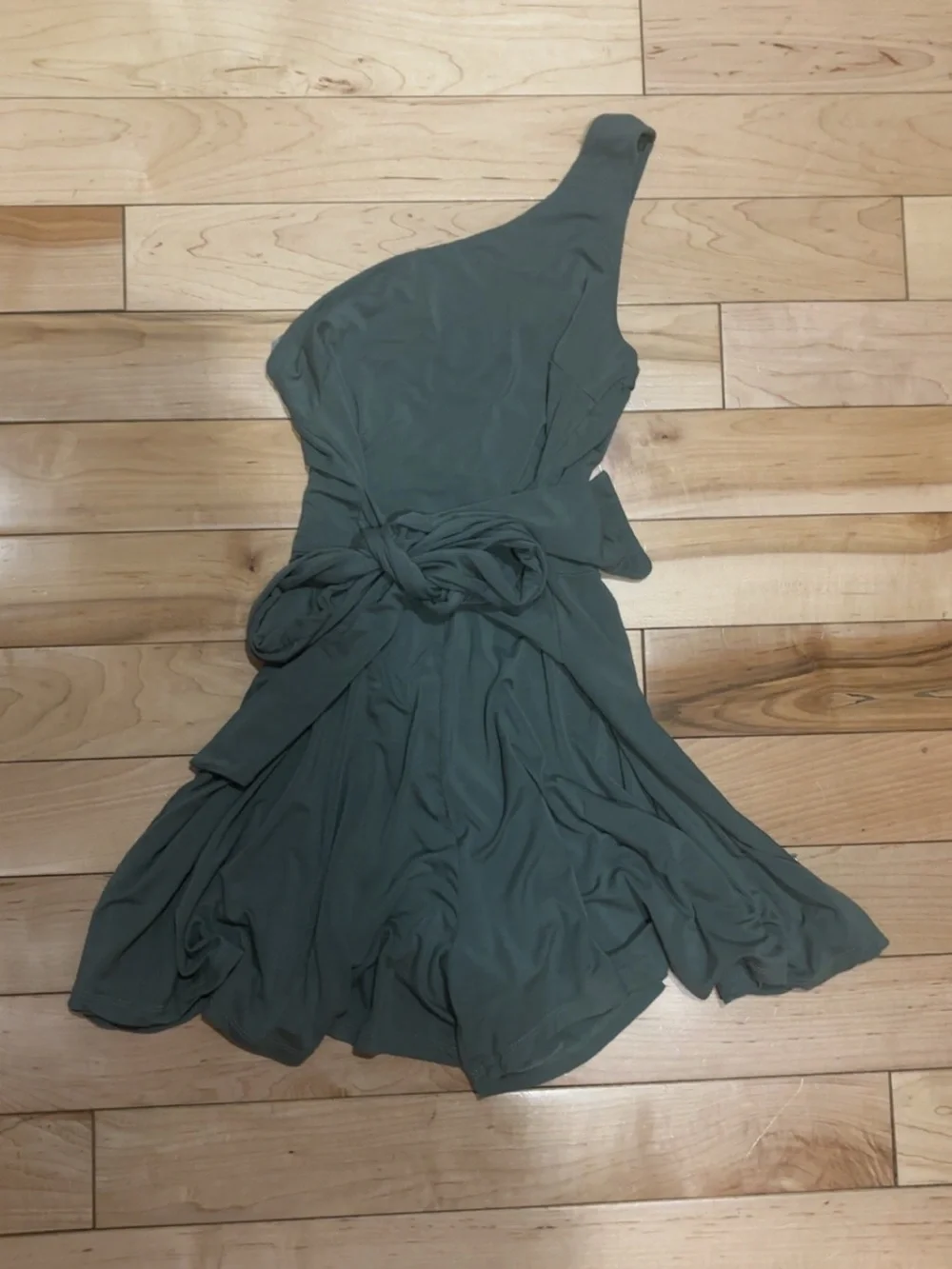LULU’S SUNNY SOIRÉE DARK SAGE GREEN ONE-SHOULDER TIE-FRONT ROMPER
